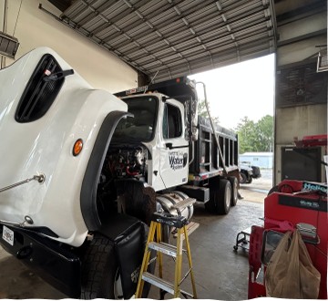DUMP TRUCK BEING REPAIRED